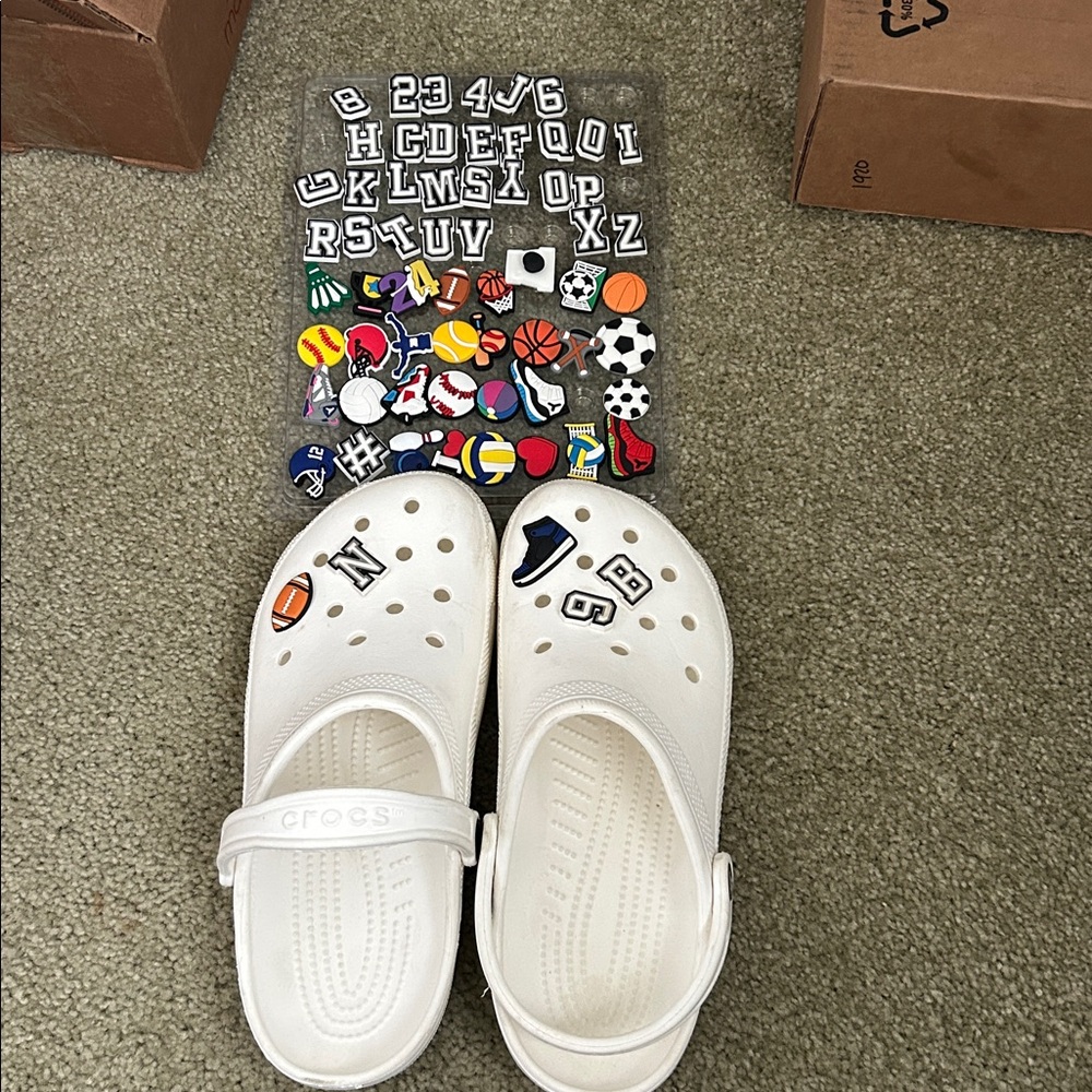 Men’s white crocs with Jibbts size 8